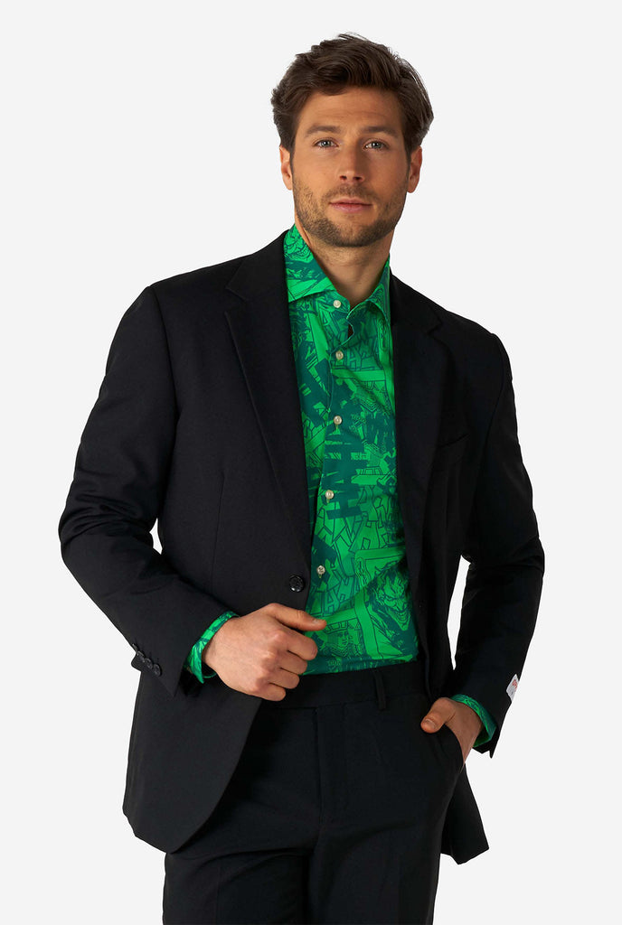 Man wearing green dress shirt with The Joker print