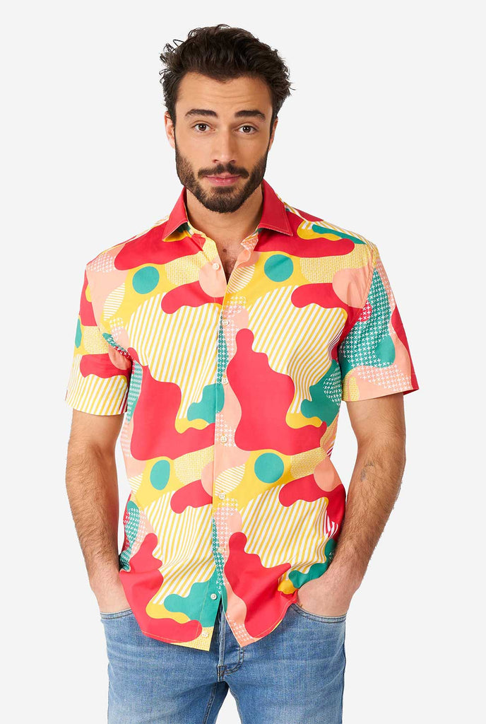 Man wearing summer shirt with colorful camouflage print