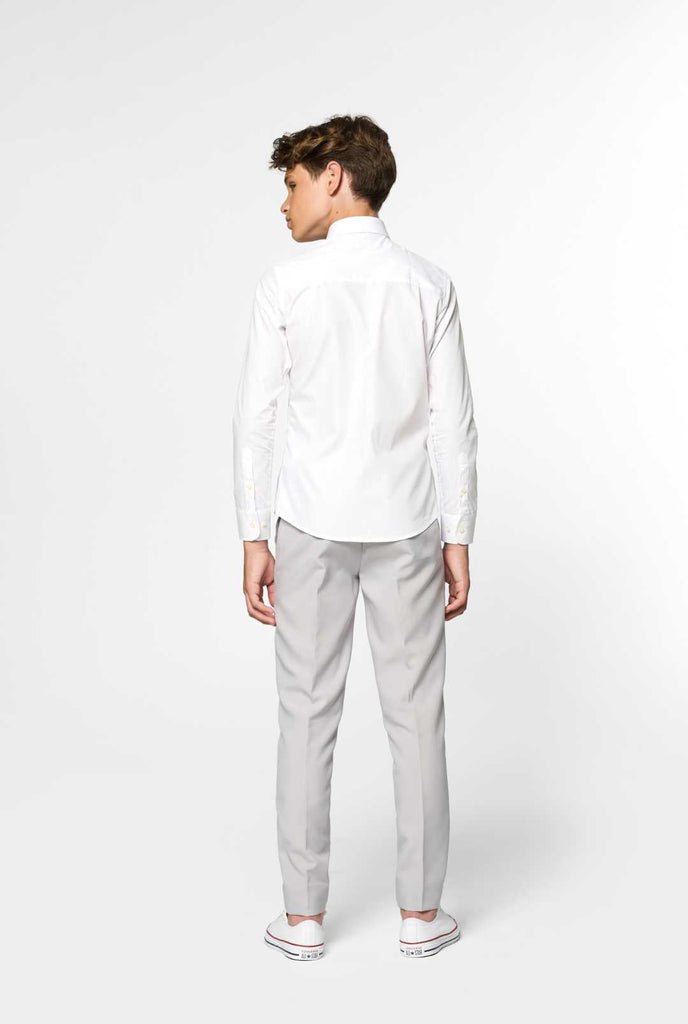 Long sleeve white shirt for boys worn by boy with hand in pocket
