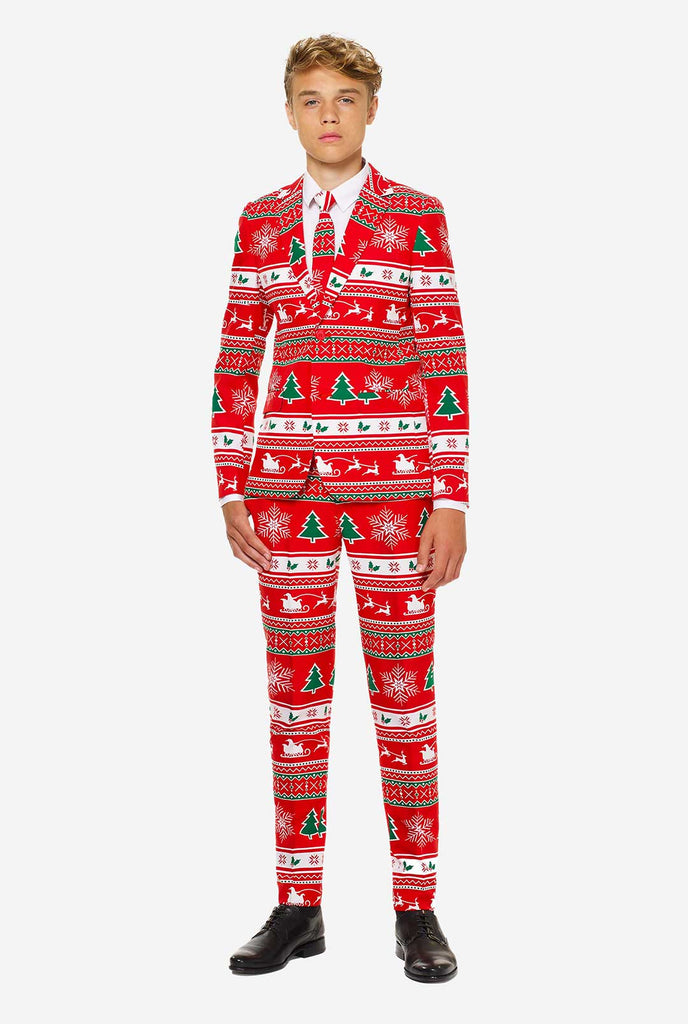 Teen wearing red Christmas suit