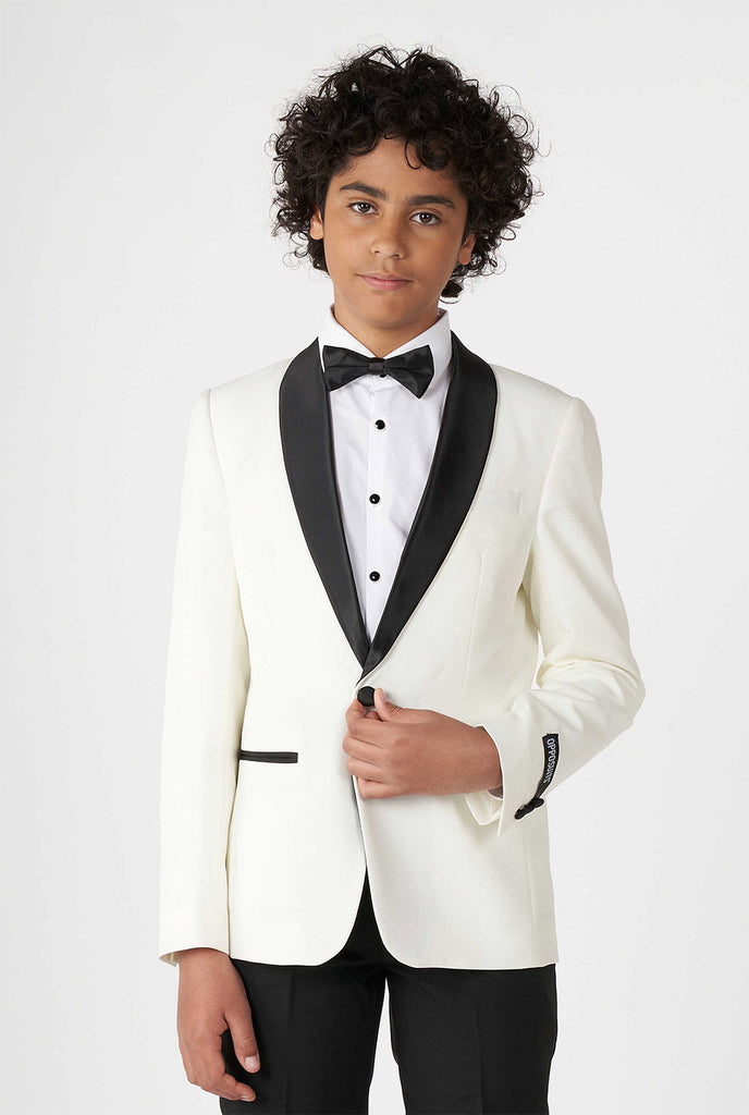 Teen wearing white and black tuxedo