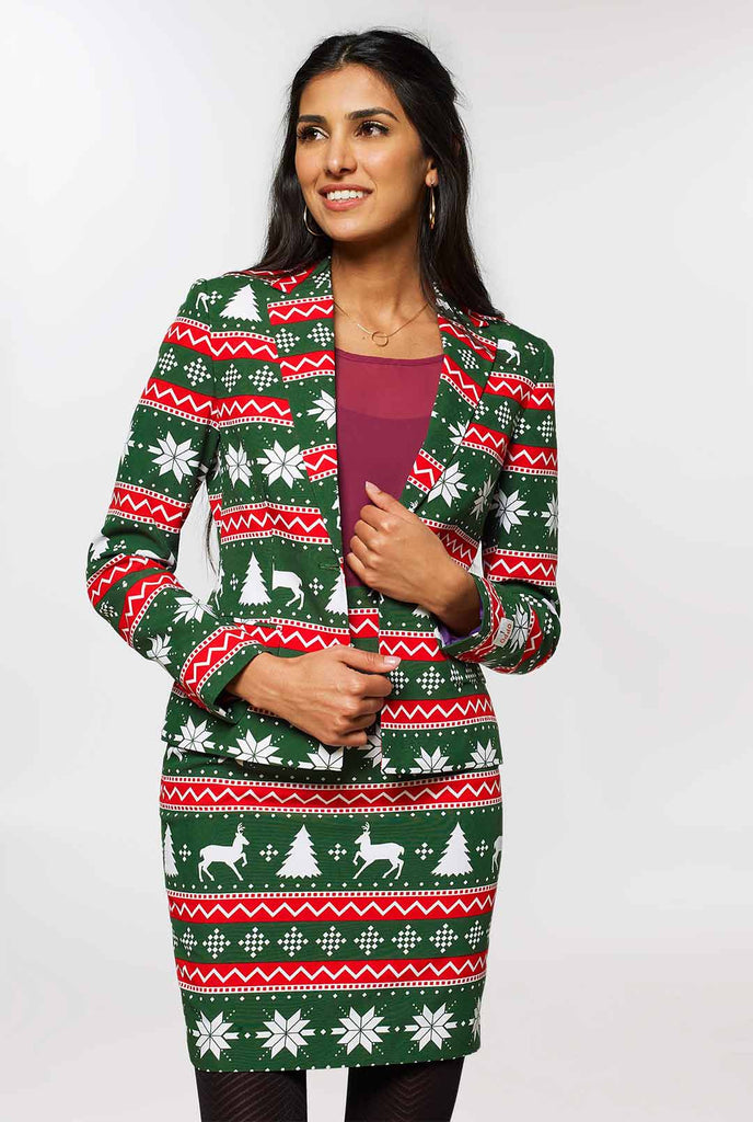 Woman wearing green and red Christmas suit