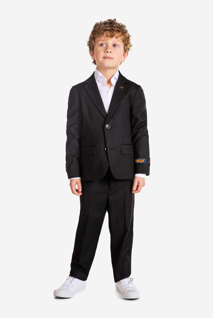 Boy wearing black OppoSuits Daily kids suit